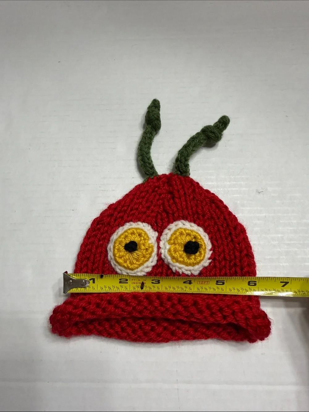 Red Knit Kids Beanie with Yellow Eye Detail and Green Antennae